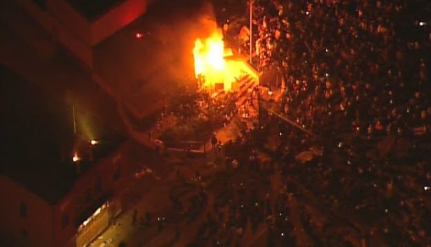 Minneapolis Third Precinct police station set on fire after rioters break in