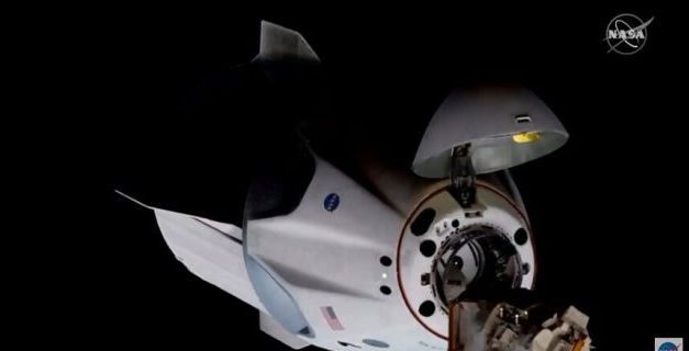 SpaceX spacecraft docks with International Space Station on historic NASA mission