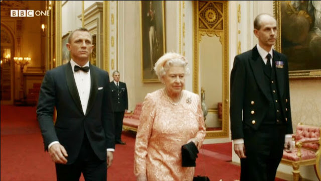 Writer Recalls Queen Elizabeth II’s James Bond Sketch and Her Telling Danny Boyle: “I Think I Should Have a Line”