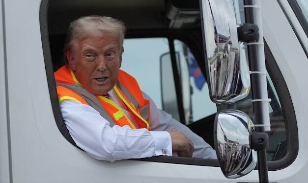 Donald Trump Asks Reporters How They Like His New Garbage Truck