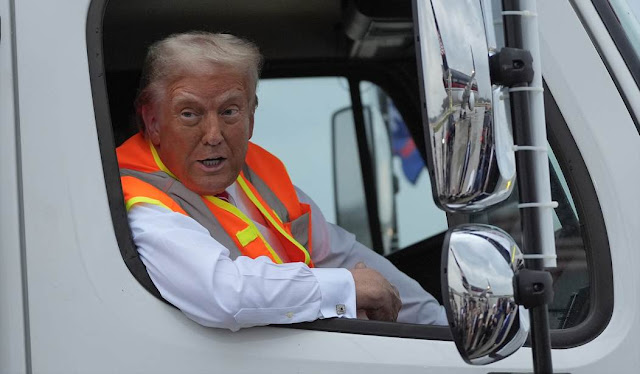 Donald Trump Asks Reporters How They Like His New Garbage Truck